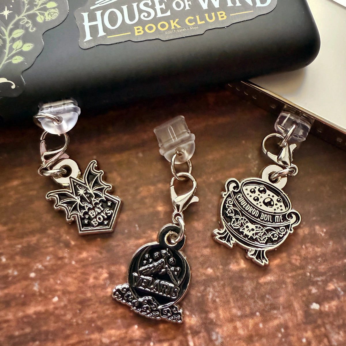 A Court of Thorns and Roses Dust Plug Charms